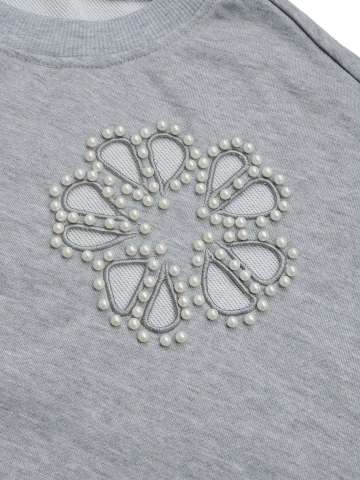 Perfee Cutout Pearl Round Neck Long Sleeve Sweatshirt.