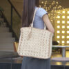 Square tassel single shoulder grass woven bag small fresh hollow handmade grass woven bag women's beach bag
