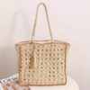Square tassel single shoulder grass woven bag small fresh hollow handmade grass woven bag women's beach bag
